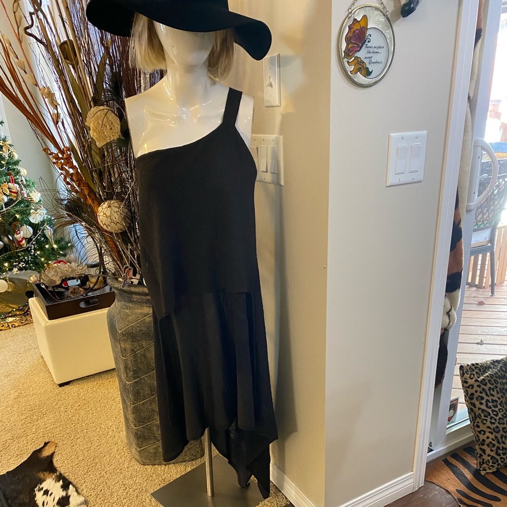 Black dress.Size M/L. Worn 1 time . Looks like brand new.